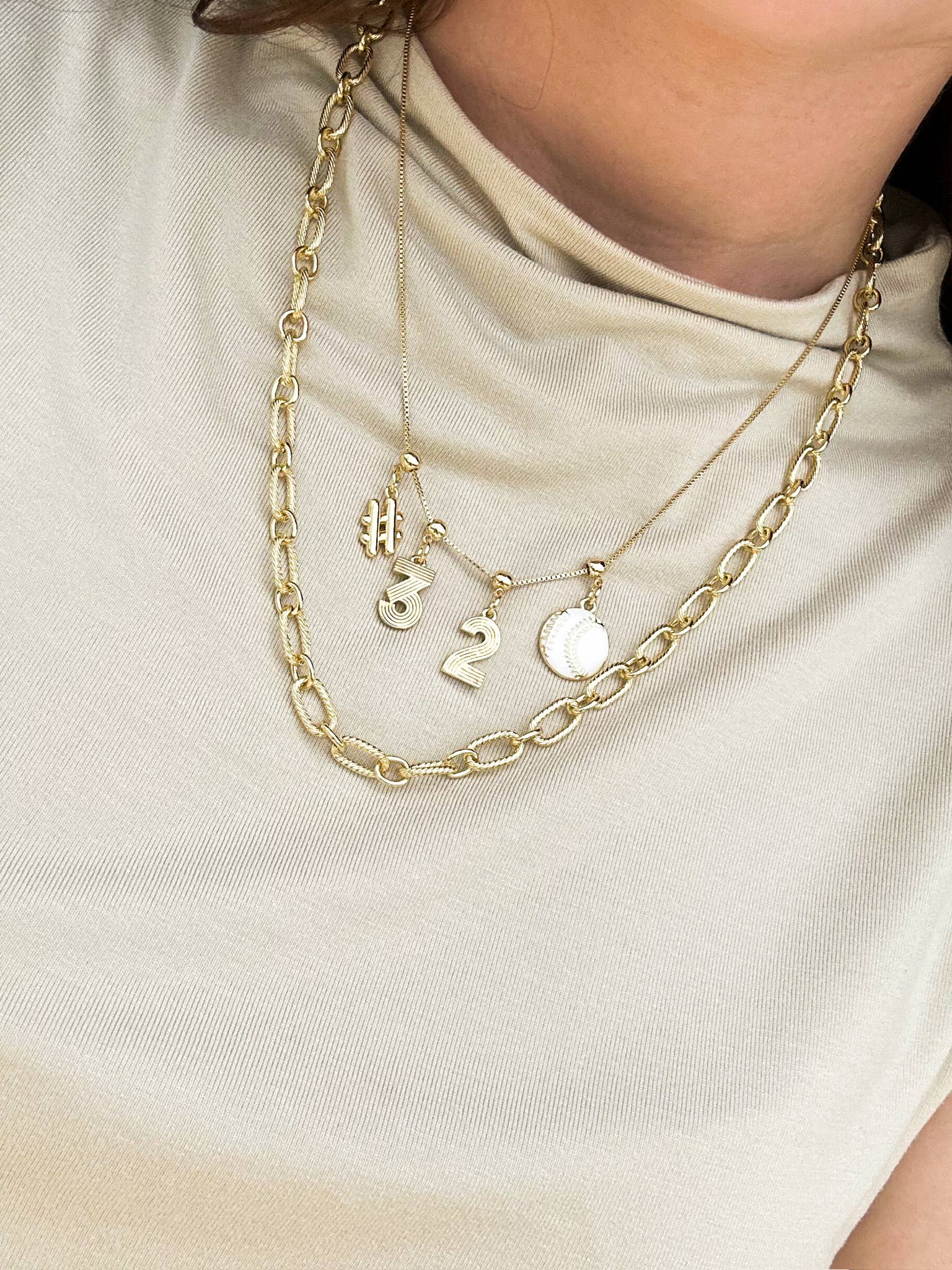 WHITE BASEBALL GRIP CHARM: One Size